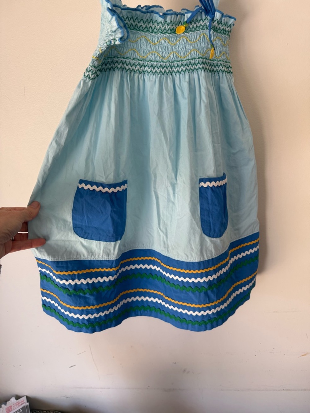 Hanna Andersson Light Blue Smocked dress with Blue Pocket Accents.